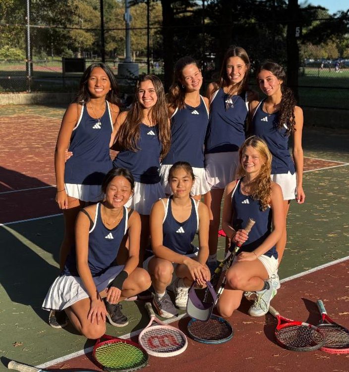 Five Tennis Team members stand behind three members kneeling.